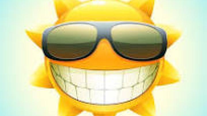 Sol med stort smil og solbriller